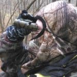 The author glasses for deer while waiting in stand