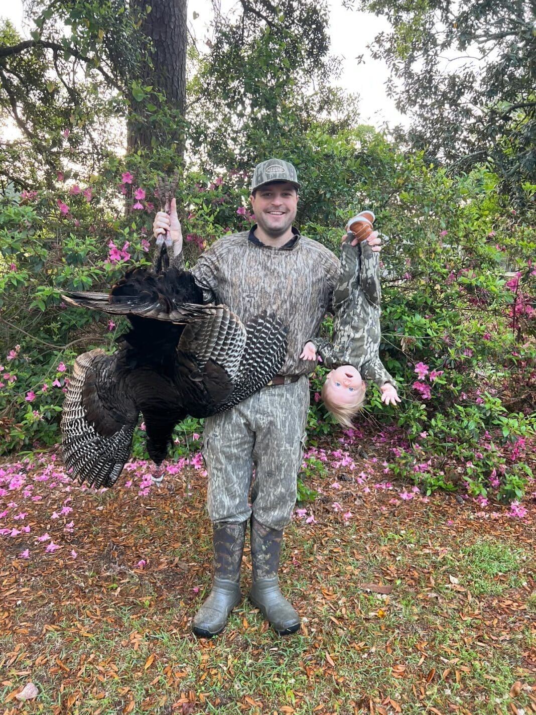 Adam Carson, St. Matthews SC, bagged this turkey and his son, Asher (10 months old), got in on the fun. lol