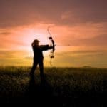 Bowhunter at Sunset