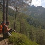Hiker Resting in Mountains