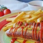 Curry Infused Wild Boar Bratwurst Served with Homemade Fries