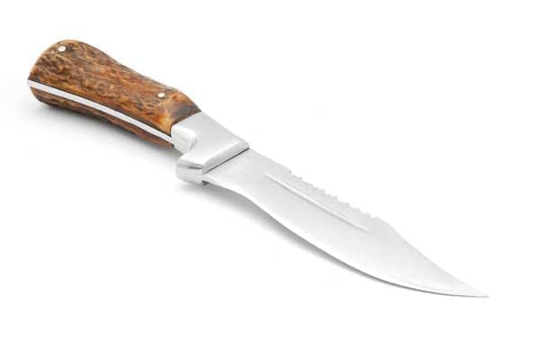 Survival knives with thick and heavy blades and comfortable grips