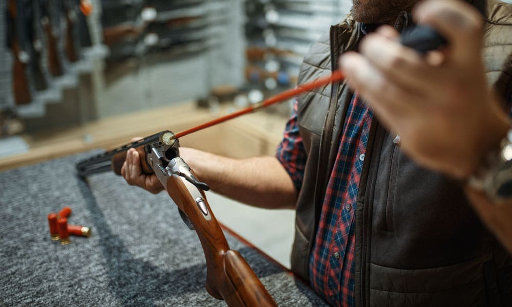 use the gun cleaning brush attachment at the end of your gun cleaning rod - Hunting Magazine